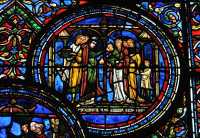 92 Thomas caresse un enfant dans les bras de sa mère