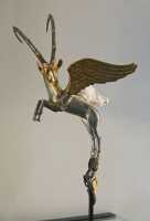 138 - Bouquetin - Anse d'un vase (4°s.) *