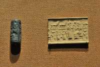 11 Sceau cylindre - Adorateur devant un dieu assis - Elamite (Luristan 1500±)