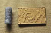 34 Sceau cylindre - Héros ailé attaquant un lion qui attaque un taureau (Néo-babylonien 6° siècle)