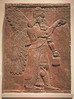518 - Nimrud (± 860) Génie ailé protecteur faisant une libation
