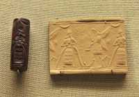 02 Sceau cylindre - Dieu au vase jaillissant (Assyrien - 12°siècle) Jaspe