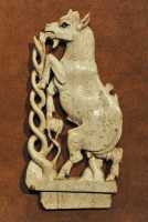 23 Chèvre broutant un arbuste - Ivoire - Nimrud (Néo-Assyrien 8° siècle)
