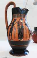 118 Cruche attique - Un homme offre une rose à une femme (± 520)