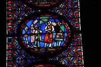 14 Akhior attaché à un arbre