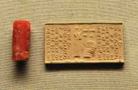 12 Sceau cylindre - Adorateur devant un dieu assis - Kassite - Règn de Kurigalzu I (14° siècle) Cornaline