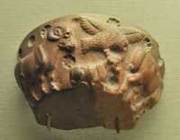 28 Rapace attaquant un agneau - Bol en calcaire (Sumer 3300-2900)